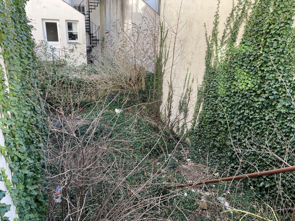 Lot: 73 - LAND WITH POTENTIAL CLOSE TO HOVE SEAFRONT - View of land with rear property